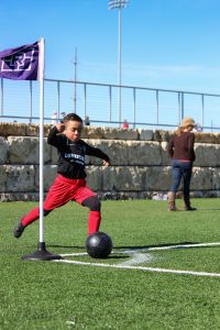 Boy Playing Soccer